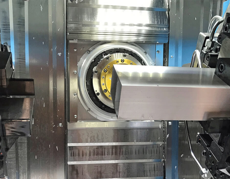 An aluminum profile is machined in and extrusion machining center.